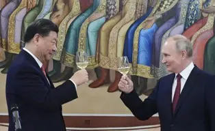 Putyin az orosz-kínai gazdasági kapcsolatokat méltatta Harbinban